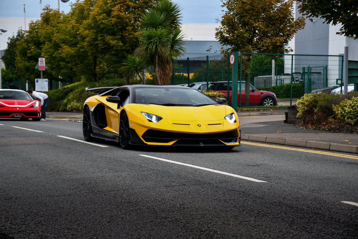 Yellow Lamborghini Aventador SVJ on the road